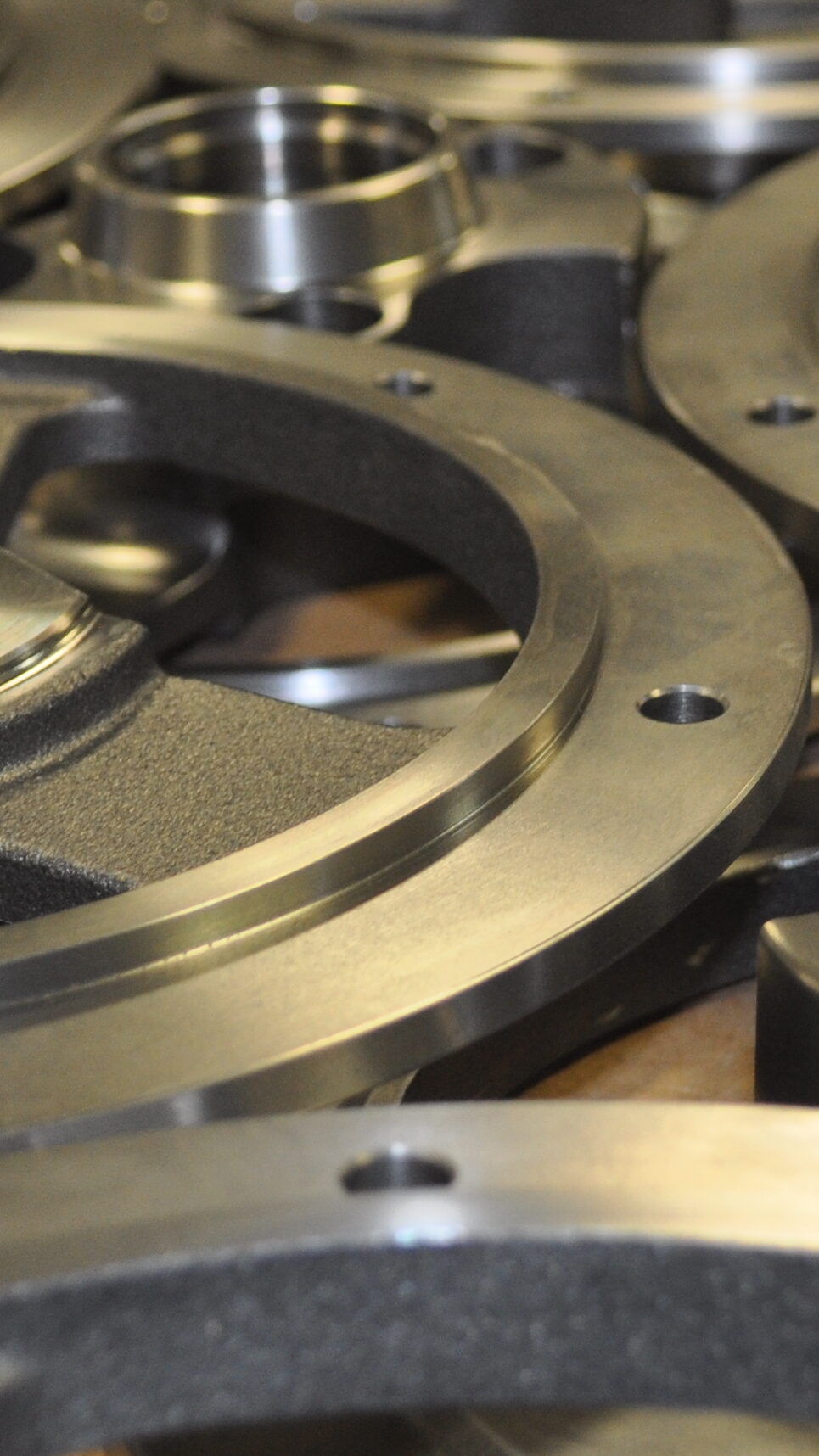 Close-up of metal components used in refrigeration systems for transportation, showcasing intricate designs and precision engineering essential for efficient cooling solutions.