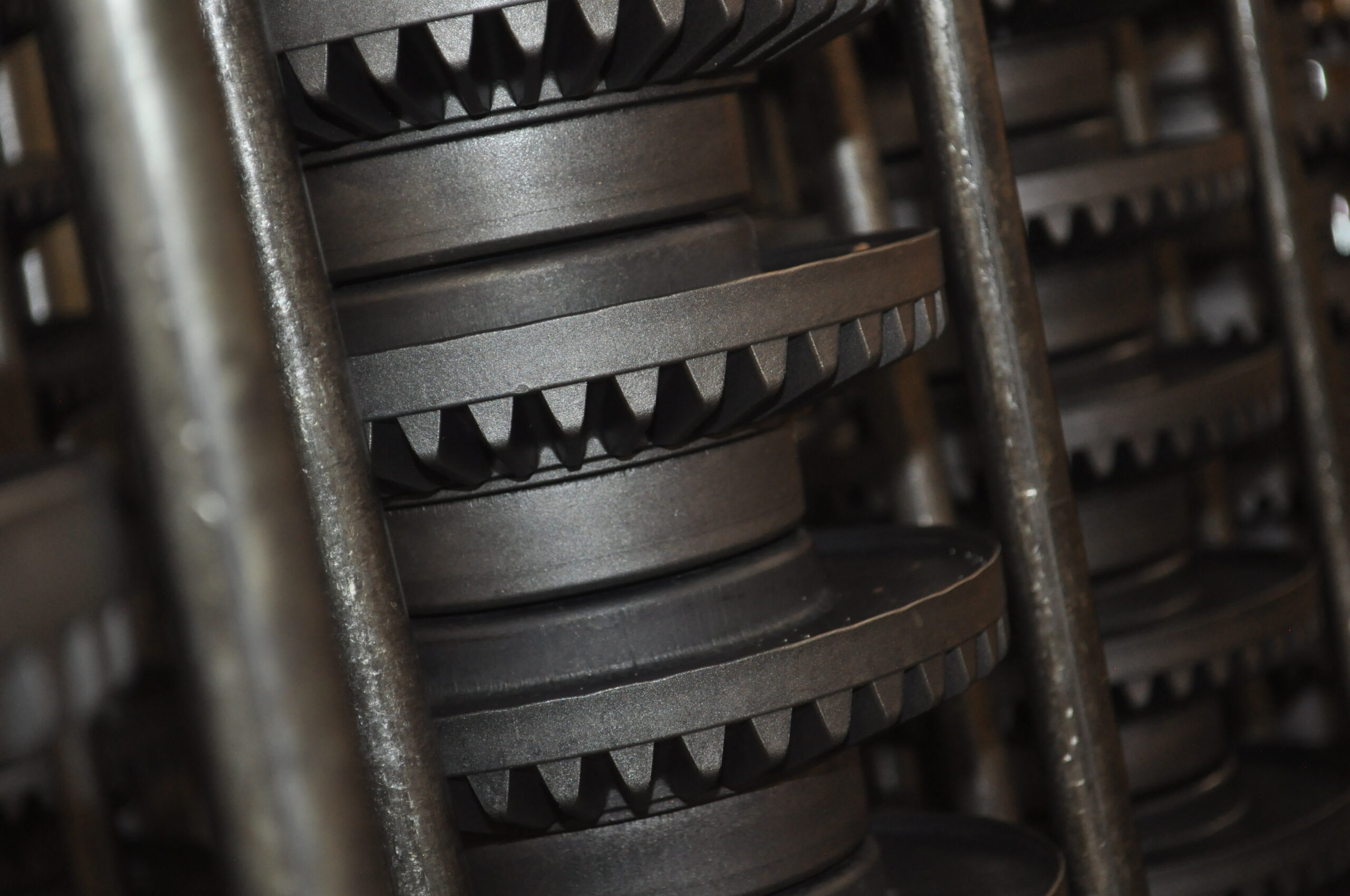 Close-up of extreme duty centrifugal clutches, showcasing stacked friction discs and their serrated edges, designed for high-performance applications in machinery.